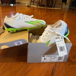 Brand new in box adidas youth soccer cleats.  Size 3.5.  Never been worn.